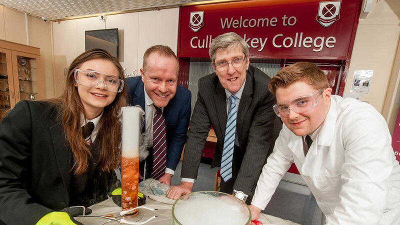 Cullybackey College pupils Simone Lyle and Robert Anderson join John O&#39;Dowd and principal David Donaldson 