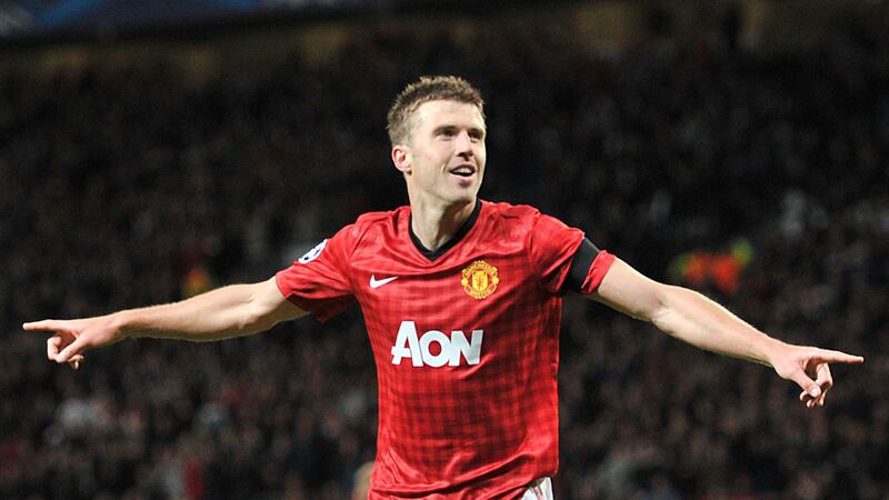 England international Michael Carrick moves from Spurs to Manchester United to solve the Old Trafford club's midfield problems