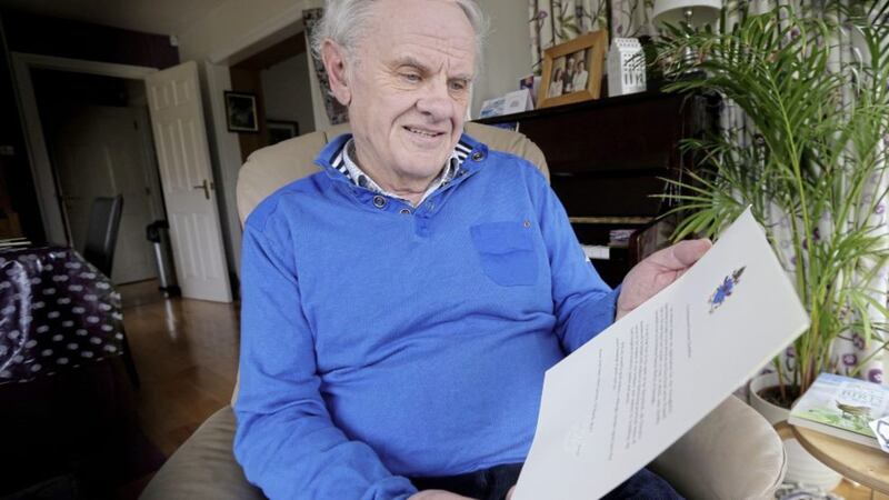 The Rev Dr Norman Hamilton at home in Ballymena with his letter from Pope Francis. Picture by Hugh Russell 