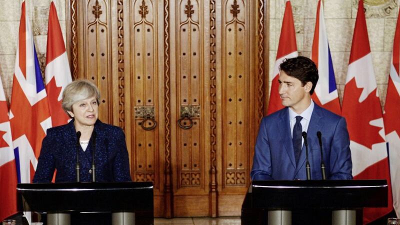 British Prime Minister Theresa May during a press conference with Canadian Prime Minister Justin Trudeau at Parliament Hill in Ottowa. Picture by Stefan Rousseau, Press Association 