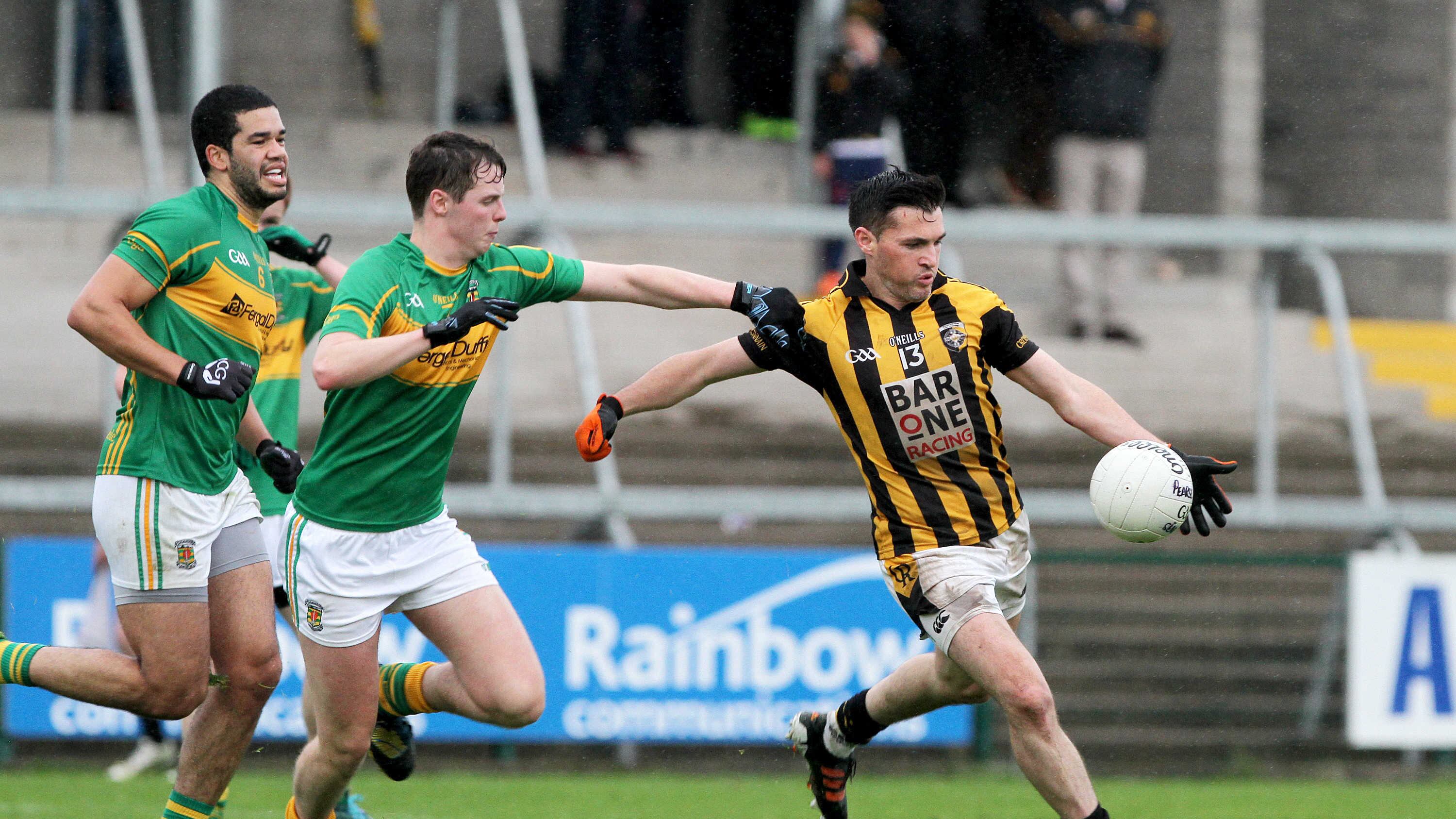 Crossmaglen's John Murtagh is challenged by Pearse Óg's Conor McNicholl and Darnell Parkinson at the Athletic Grounds<br />Picture: Colm O'Reilly