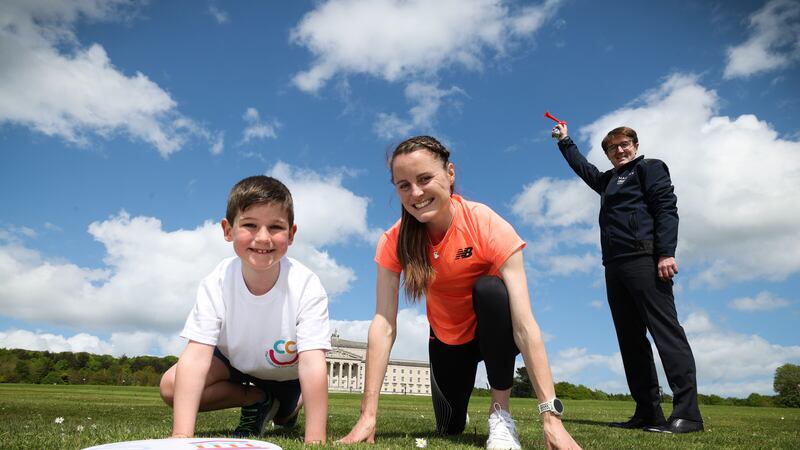 Belfast boy, Conor Maguire with Ciara Mageean and Jim Burke of Hagan Homes ahead of the CCUC Stormont Mile