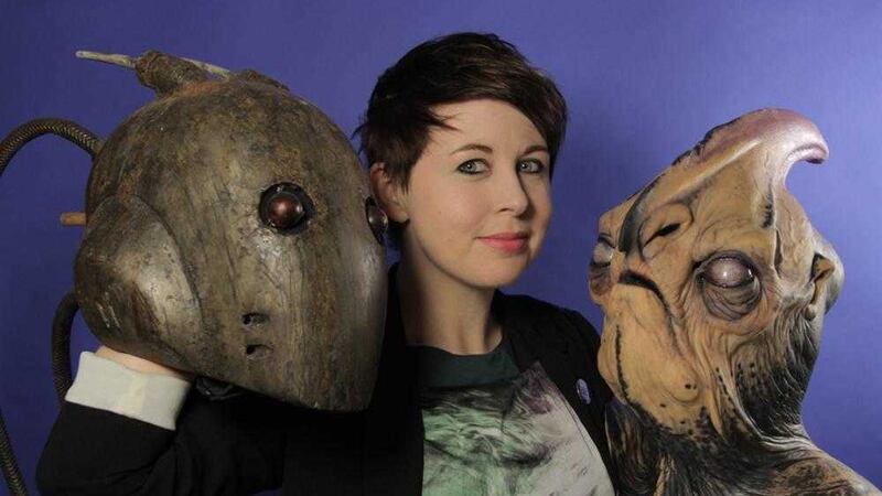 Special effects creator Kate Walshe with her alien head creations Rusty and Fred 