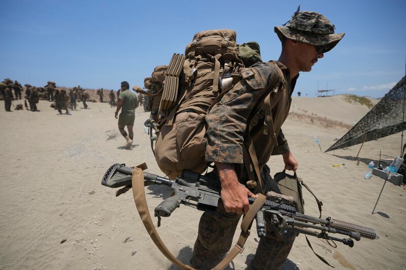 A US trooper in battle during the joint military exercise (Aaron Favila/AP)