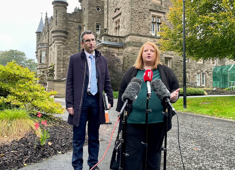 Alliance leader Naomi Long (right) alongside party colleague Andrew Muir MLA speaking outside Stormont Castle