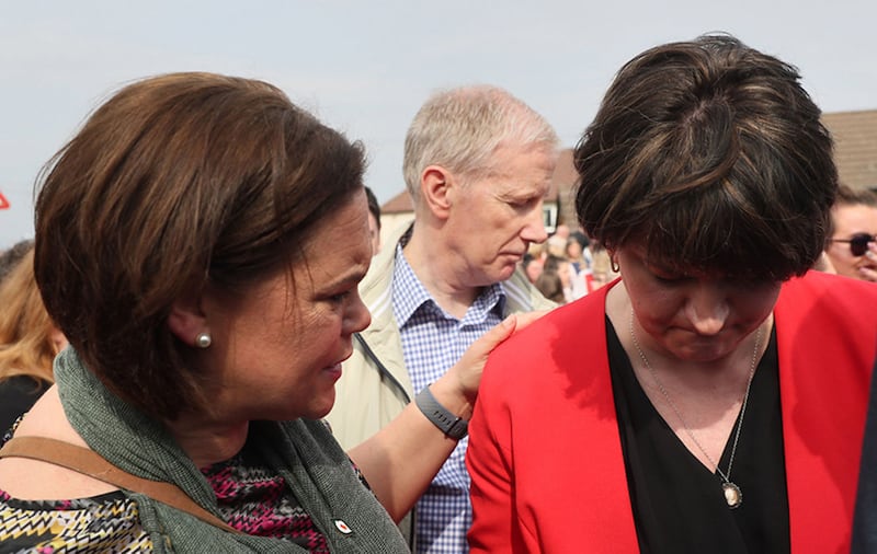 Sinn F&eacute;in President Mary Lou McDonald (left) and DUP leader Arlene Foster with DUP MP Gregory Campbell at a vigil today following the fatal shooting of Lyra McKee. Picture by Brian Lawless, PA Wire&nbsp;
