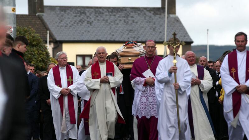 The coffin of Anthony Foley is shouldered from St Flannan's church in Killaloe.&nbsp;