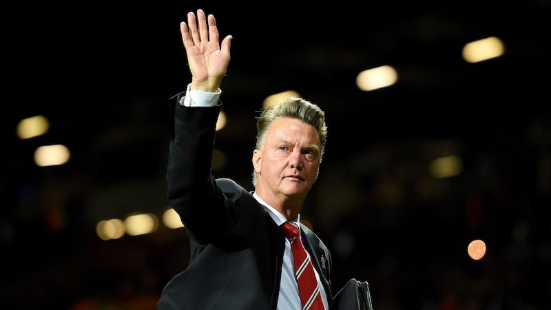 Van Gaal salutes the Old Trafford faithful after Wednesday's Champions League win against Wolfsburg