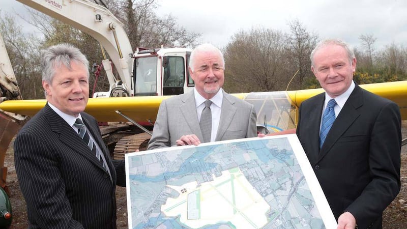 The first and deputy first ministers with Terence Brannigan of the Maze Long Kesh Development Corporation in 2013 at the launch of plans to redevelop the site. Picture by Mal McCann 