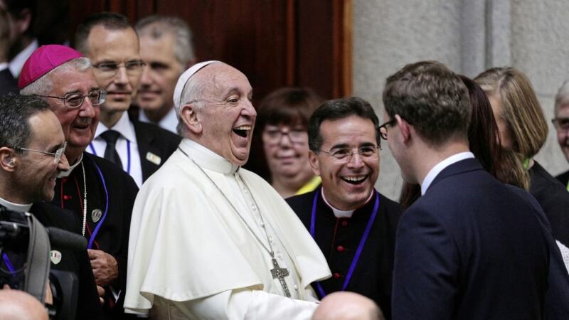 Pope Francis shares a joke as he leaves St Mary&#39;s Pro Cathedral in Dublin during his visit to Ireland for the World Meeting of Families in August 2018. Picture by Aaron Chown/PA Wire 