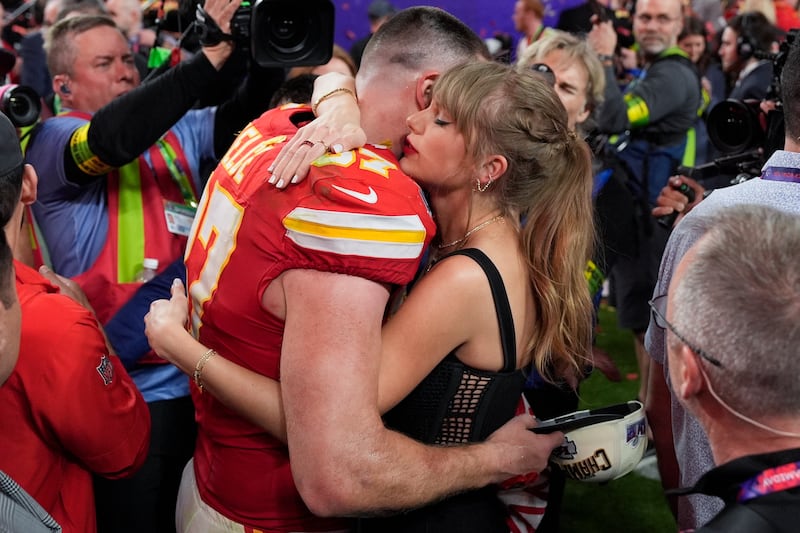 The pair embrace after the game (John Locher/AP)
