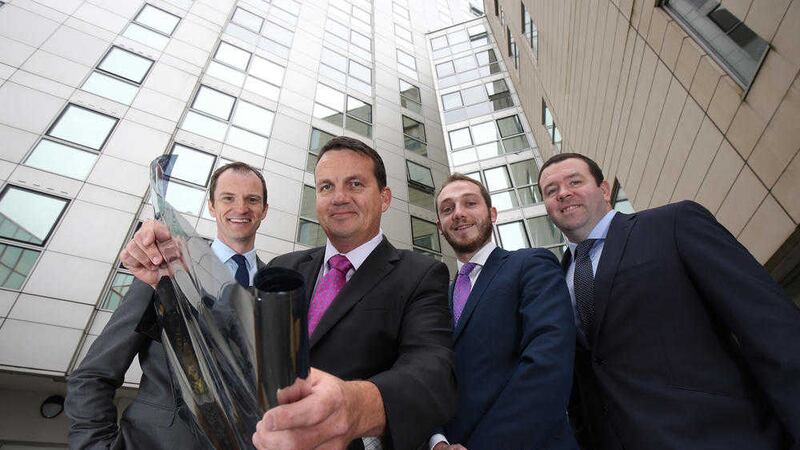 Announcing the installation off a new high performance solar window film at the Obel are Will Miscampbell from Fetherston Clements, Ben Hickling of Solartek Films and Jonathan Haughey and Ciaran O&rsquo;Kane from Lisney 