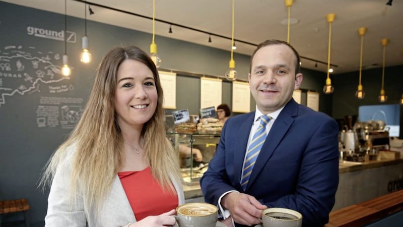 Ground Espresso has opened a new store in Belfast&#39;s Victoria Square. Pictured are Gary Martin, associate director at Lambert Smith Hampton and Hannah Houston, senior support manager, Ground Espresso Bars. 