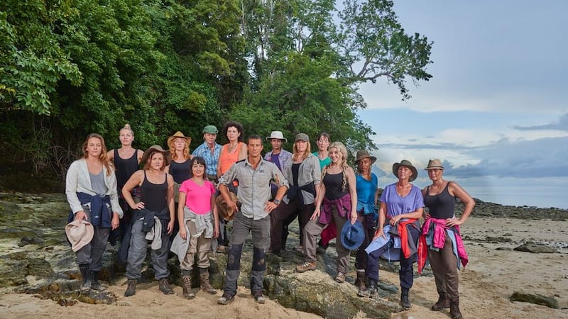 Bear Grylls and the female contestants from survival show The Island 