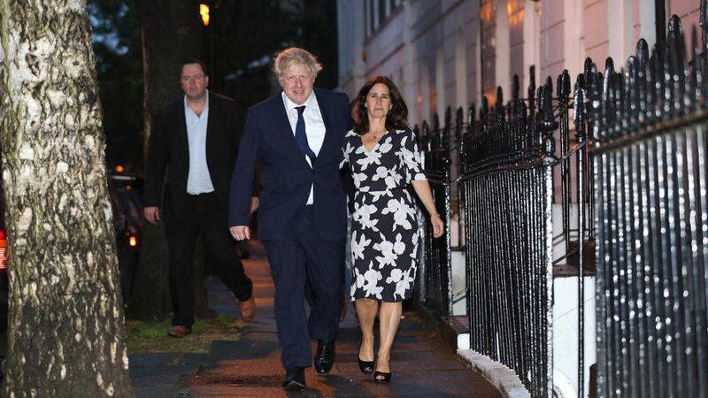 Boris Johnson and his wife Marina after casting their votes in north London on Thursday. Picture by: Isabel Infantes/PA 