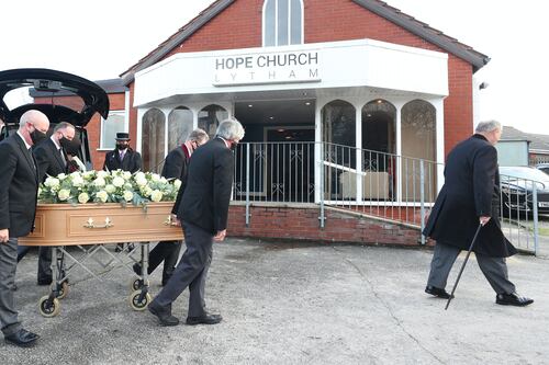 Mourners wear red braces for funeral of comedian Bobby Ball
