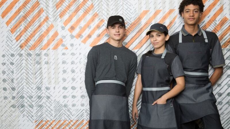Burger giant’s monochrome outfits are being hilariously compared with dystopian sci-fi worlds.