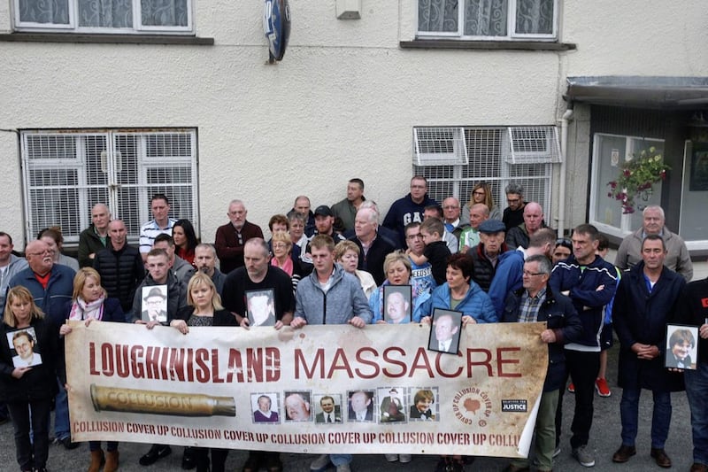 Loughinisland families gathered outside Heights Bar to protest at the time of the arrest of the journalists. picture Bill Smyth. 