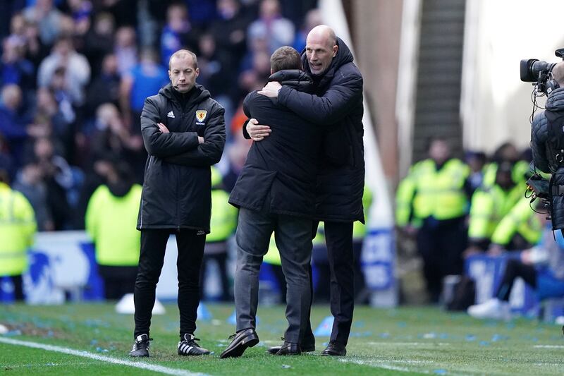 Philippe Clement embraces Brendan Rodgers following the 3-3 draw at Ibrox