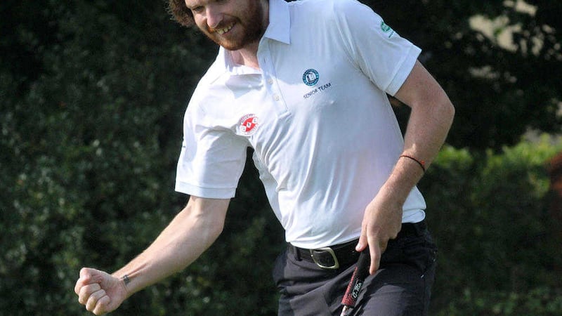 Ryan Gribben, then with Warrenpoint, holes the winning putt on the 20th green in the semi-final of the 2014 AIG Barton Shield at Carton House 