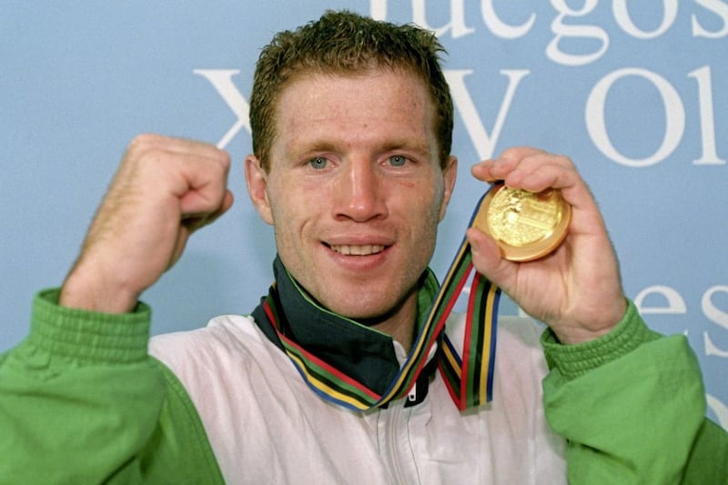 Michael Carruth celebrates with the gold medal he won at the 1992 Olympic Games in Barcelona 