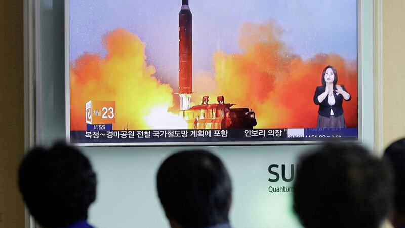 People watch a TV news channel airing an image of North Korea&#39;s ballistic missile launch at the Seoul Railway Station in Seoul, South Korea. Picture by Ahn Young-joon, File, Associated Press 