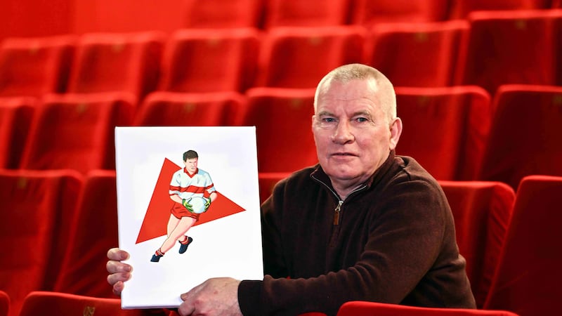 Tony Scullion with an artwork depicting him playing for Derry.