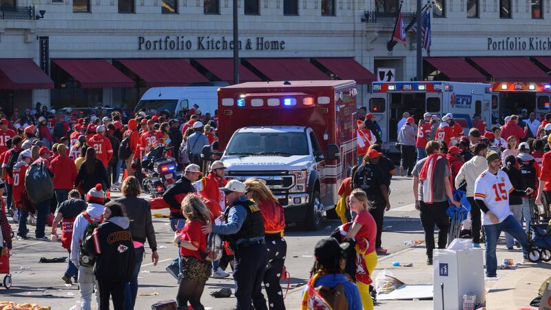 Police clear the area following a shooting at the Kansas City Chiefs NFL football Super Bowl celebration in Kansas City (Reed Hoffmann/AP)