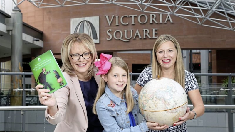 Laura McCorry of National Museums Northern Ireland, 11-year-old Amy Willis, from Ballynahinch, and Victoria Square manager Michelle Greeves announce the interactive initiative at the centre 