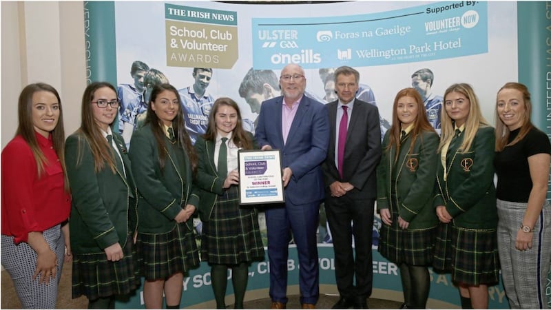 Pupils and teachers from St Catherine&rsquo;s College, Armagh accept the School Contribution Award at the Irish News School, Club and Volunteer Awards. Pictured from left to right: Teacher Ciara Donnelly, Leanne Donnelly (Year 14 student), Caoimhe Donnelly (Year 12), Niamh Fullen (Year 14), Professor Peter Finn (Principal of St Mary&rsquo;s University, Belfast), Noel Doran (Editor of The Irish News), Clara Conlon (Year 12), Casey Mullan (Year 11) and teacher Ciara Marley 
