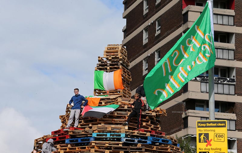 Youths gather at the New Lodge bonfire in north Belfast&nbsp;