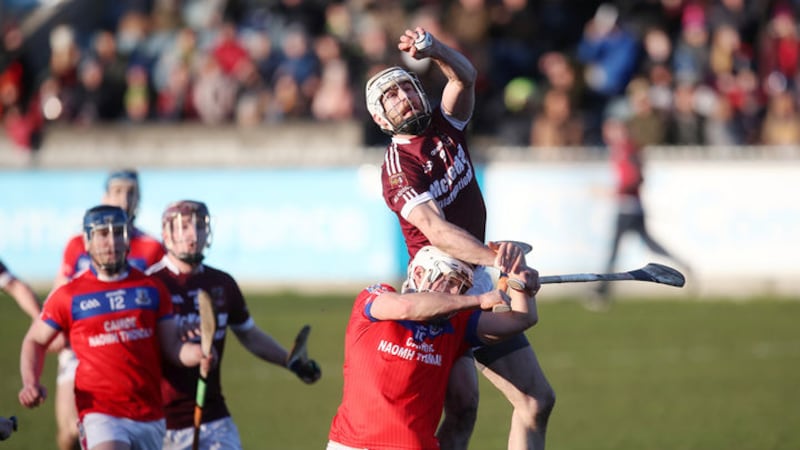 Neil McManus rises above St Thomas's Darragh Burke to win a high ball during Saturday's AIB All-Ireland Club SHC semi-final at Parnell Park Picture by John McIlwaine