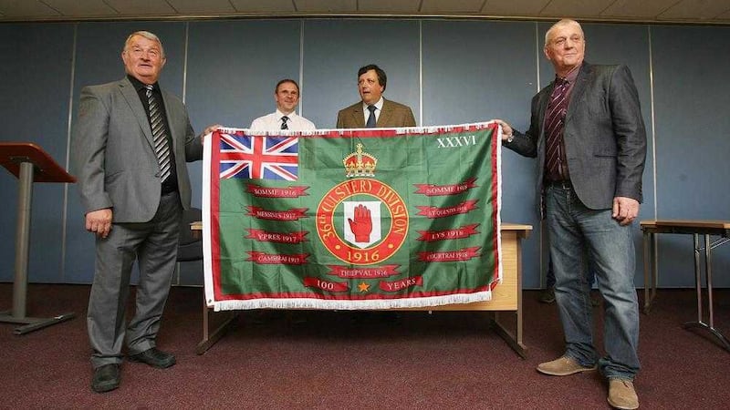 Jim Wilson and Jackie McDonald at the unveiling of a new Somme flag by the Loyalist Communities Council. Picture By Mal McCann 