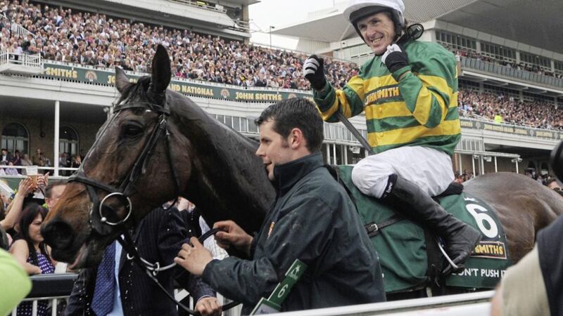 Don&#39;t Push It and Tony McCoy celebrate their victory after the 2010 John Smith&#39;s Grand National at Aintree Racecourse, Liverpool. 