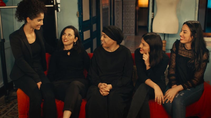 A scene from Four Daughters showing actors Ichraq Matar and Nour Karoui with Olfa, Tayssir and Eya