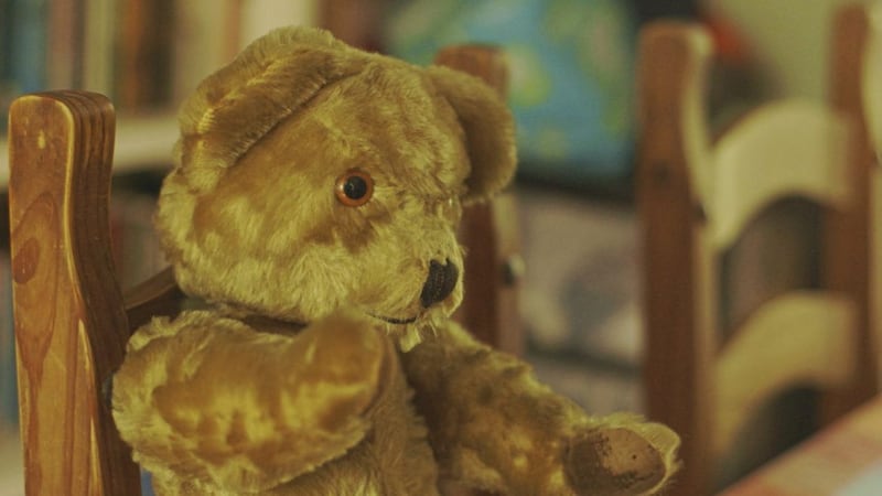 One of Alex Kane&#39;s earliest memories is of a teddy bear given to him by adoptive mum Adelaide and her husband Sam. Picture by BBC 