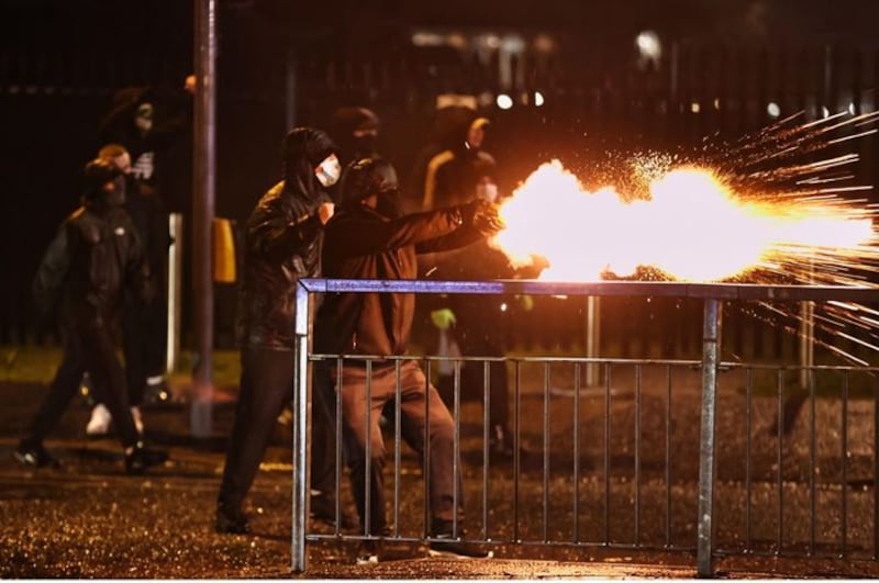 &nbsp;Youths fire fireworks at the PSNI on the Springfield road, during further unrest in Belfast. Picture date: Thursday April 8, 2021.