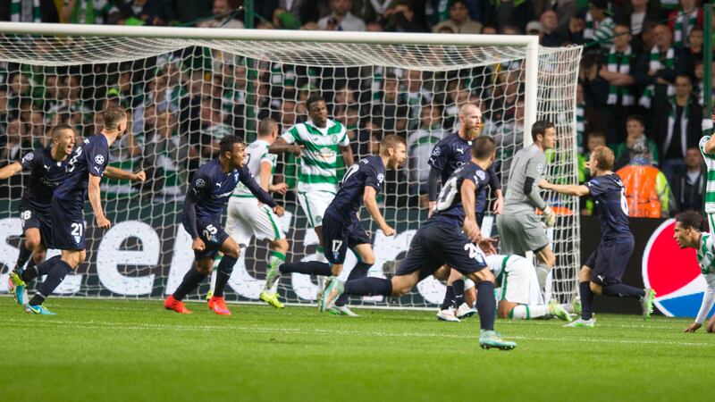 The Malmo team celebrate their late second goal at Celtic Park last week<br />Picture: PA