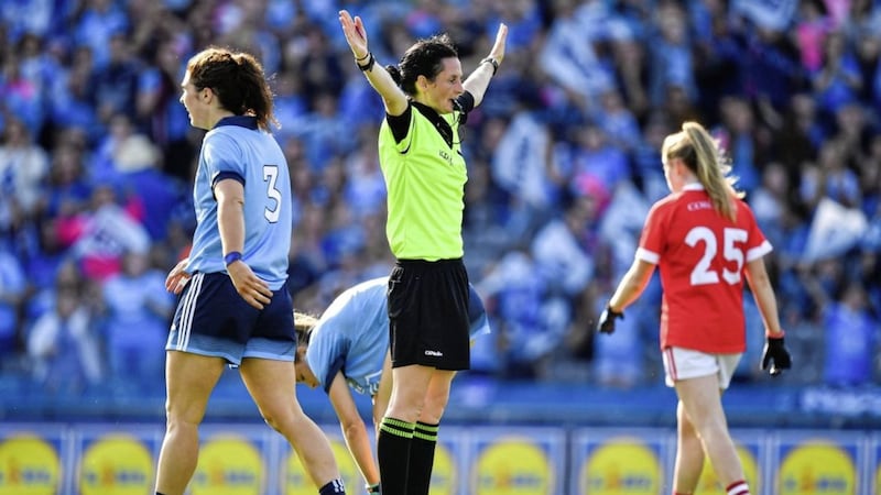 Referee Maggie Farrelly awards a penalty to Dublin during the TG4 All-Ireland Ladies SFC semi-final match against Cork.<br /> Photo by Brendan Moran/Sportsfile