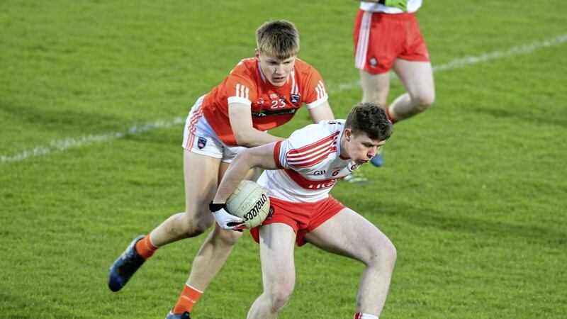 05/04/2017: Derry&#39;s Michael McEvoy with Rian O&#39;Neill of Armagh during the Ulster u21 Championship semi final played at Celtic Park on Wednesday night. Picture Margaret McLaughlin 