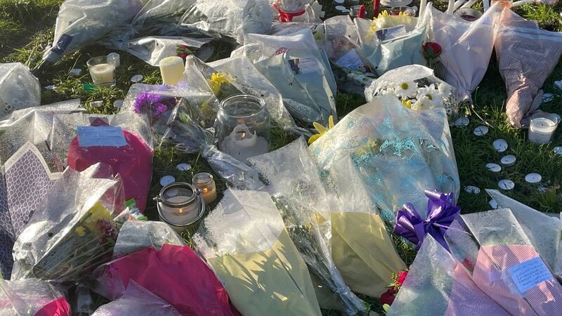 Floral tributes left at the scene at playing fields in Wolverhampton where Shawn Seesahai died