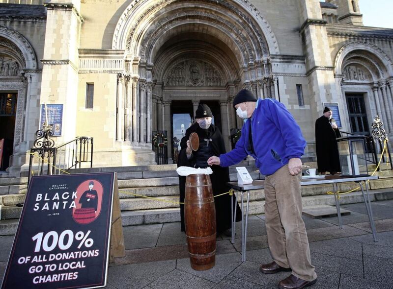 Dean Stephen Forde during the Black Santa sit-out at St Anne's Cathedral in Belfast. Picture by Hugh Russell