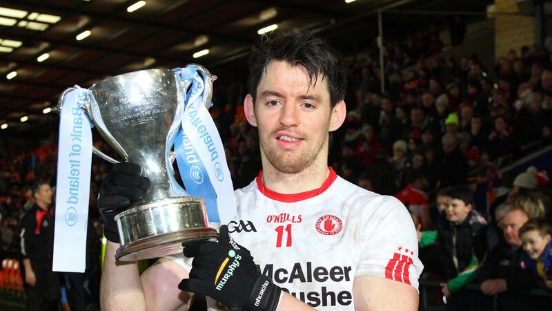 Tyrone's Mattie Donnelly with the McKenna Cup following last year's final victory over Derry at the Athletic Grounds<br />Picture by Philip Walsh&nbsp;