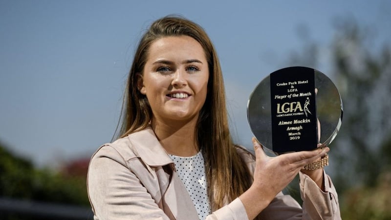 ARMAGH forward Aimee Mackin with her Croke Park/LGFA Player of the Month award for March. 