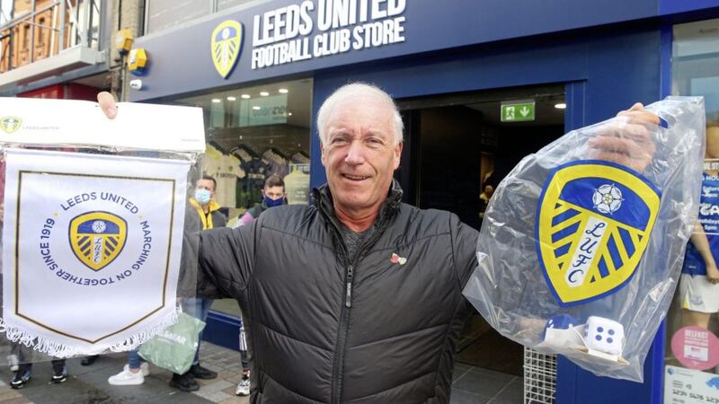 Maurice McCrory was the first customer to emerge from the Leeds official club merchandise store in Belfast, Castle Lane with some items. Picture by Mal McCann. 