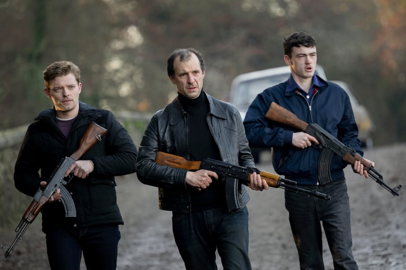 A scene from Baltimore, showing Jack Meade, Tom Vaughan-Lawlor, Lewis Brophy holding machine guns