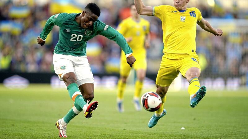 Republic of Ireland&#39;s Chiedozie Ogbene crosses under pressure from Ukraine&#39;s Vitaliy Mykolenko during the UEFA Nations League match at the Aviva Stadium in June 