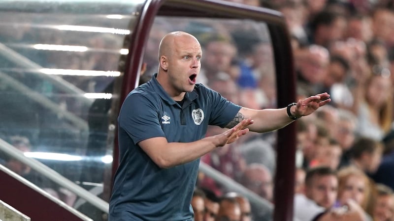 Hearts boss Steven Naismith celebrated reaching the Scottish Cup quarter-finals