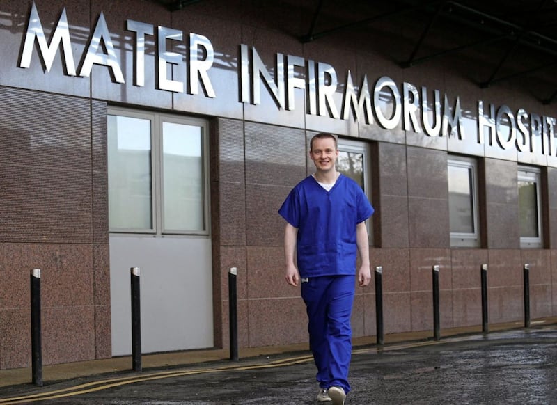 Brother Chris Gault from the Dominican Fathers who hung up his habit for surgical scrubs to work on the frontline at the Mater Hospital in north Belfast Picture Mal McCann. 