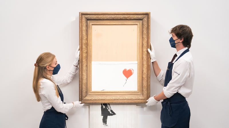 Love Is In The Bin was auctioned in London by Sotheby’s.